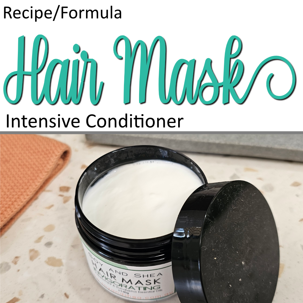A product cover photo with the text HAIR MASK in teal cursive writing in the top half of the image against a white background. The bottom half has a close-up image of a black jar with the lid resting against its side revealing a white cream. This sits on a terrazzo bench with a orange face cloth.