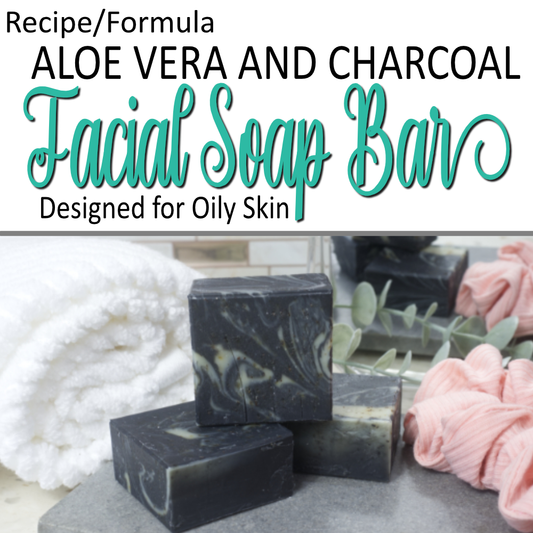 A cover photo for a formula where the bottom half of the cover photo has an image of 3 black soaps with pale green swirls stacked upon each other on a grey stone tray next to a towel and scrunchie.  The top half has decorative teal text reading Facial soap Bar with other text indicating this is a formula and some ingredients included on a white background