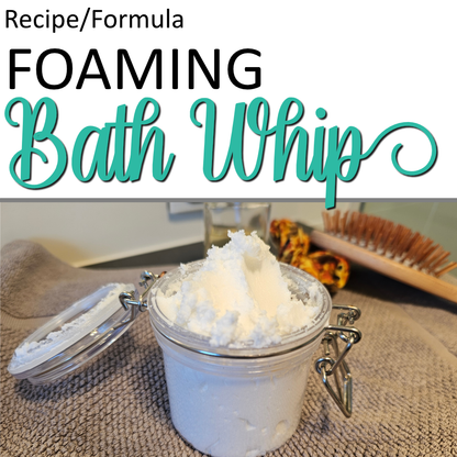 A product cover photo with the text BATH WHIP in teal cursive writing in the top half of the image against a white background.  The bottom half has an image of a clear jar filled with a white soft but solid cream standing on a brown towel with a brush and scrunchie in the background.