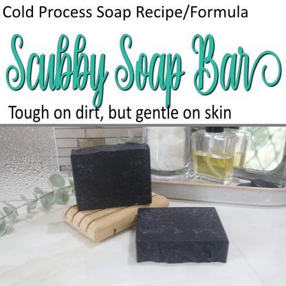 A product cover photo that has two layers.  At the top, decorative teal text advises this is a formula for a Scrubby Soap Bar that is tough on dirt but gentle on skin.  Below is an image of two black soap bars resting on a bathroom countertop.