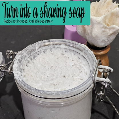 A jar filled with white whipped soap sits on a grey counter with a lathered shaving brush.  Text reads TURN INTO A SHAVING SOAP