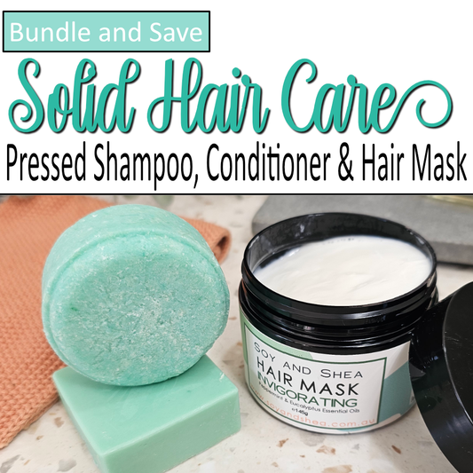A product cover photo with the text SOLID HAIR CARE in teal cursive writing in the top half of the image against a white background.  The bottom half has a image of a solid shampoo and conditioner along side a black jar with the lid removed to reveal a white cream.   The cover photo indicates this is a bundle offer of all three formulas.